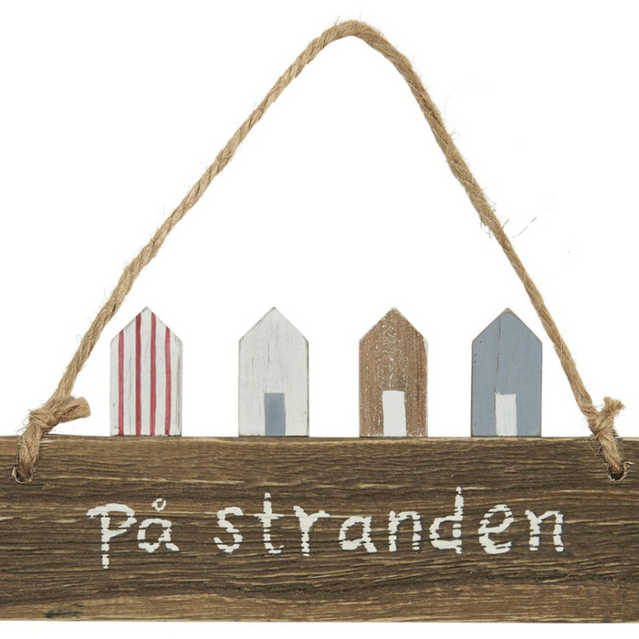 Holzschild "på stranden"